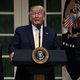 Donald Trump discusses the citizenship question and the 2020 census while flanked by Commerce Secretary Wilbur Ross (left) and Attorney General William Barr, in the Rose Garden of the White House, July 11, 2019.